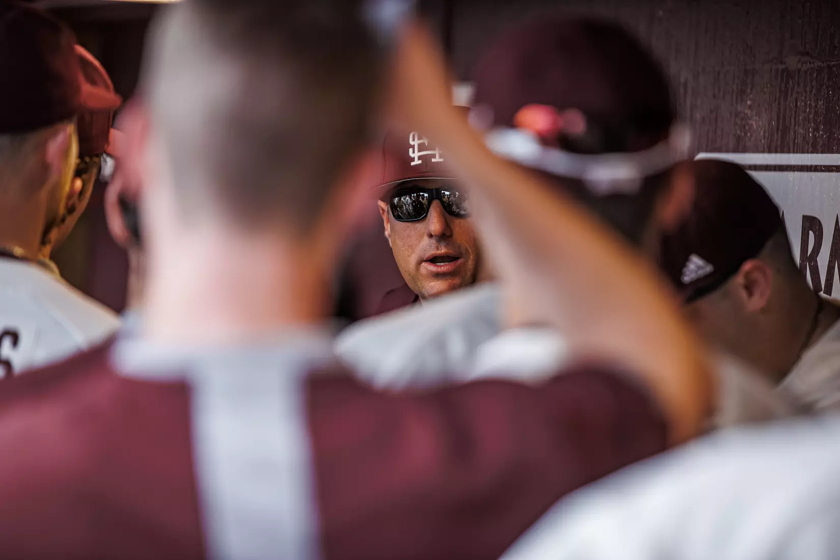 STARKVILLE, MS - February 22, 2022 - Mississippi State Head Coach Chris Lemonis addresses the team in the dugout after the game between the University of Arkansas at Pine Bluff Golden Lions and the Mississippi State Bulldogs at Dudy Noble Field at Polk-Dement Stadium in Starkville, MS. Photo By Kevin Snyder