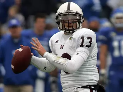 Football Works Overtime; Carroll Selected For Conference