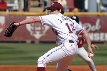 Johnson Strikes Out Eight as Dogs Top Tribe 10-4