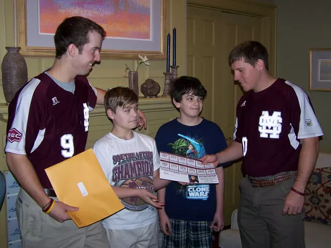 Valentine's Day Special Delivery: Diamond Dogs Deliver Season Tickets To Starkville Fans