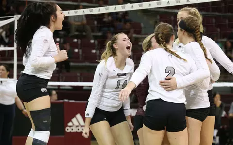 Team Celebrates After Set Win Against Missouri (Nov. 17).