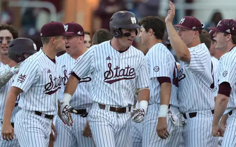 Brent Rooker team celebration