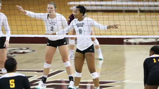 Kath and Carr Prepare for the Next Serve Against