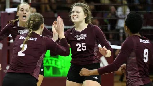 Team Celebrates After A Successful Set