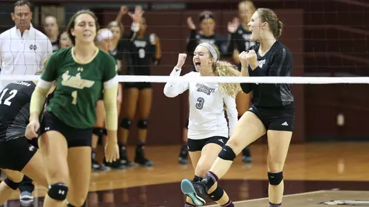 Teammates Celebrate After Set Win