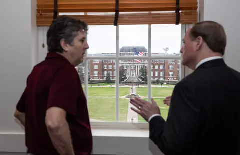 STARKVILLE, MS - JANUARY 10, 2020 - Mike Leach, the new Head Coach of the Mississippi State Bulldogs football team visits with Mark E. Keenum, University President, in Keenum's Office in Starkville, MS. Photo By Aaron Cornia