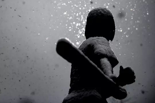 STARKVILLE, MS - January 11, 2021 - Will Clark statue outside Dudy Noble Field at Polk Dement Stadium during a snow day at Mississippi State University in Starkville, MS. Photo By Austin Perryman