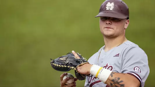 Mississippi State catcher Logan Tanner warms up earlier this season.