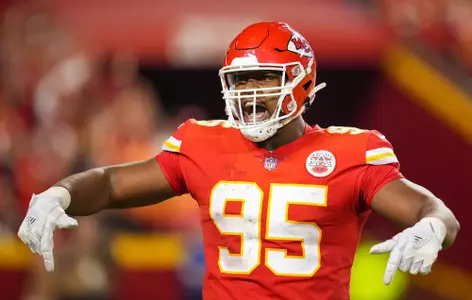 Oct 10, 2022; Kansas City, Missouri, USA; Kansas City Chiefs defensive tackle Chris Jones (95) celebrates after a delay of game penalty on the Las Vegas Raiders during the second half at GEHA Field at Arrowhead Stadium. Mandatory Credit: Jay Biggerstaff-USA TODAY Sports