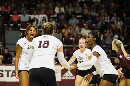 STARKVILLE, MS - October 15, 2022 - Mississippi State Middle Blocker Sania Petties (#6), Mississippi State Setter Gabby Coulter (#12), Mississippi State Outside Hitter Shania Cromartie (#4) and Mississippi State Outside Hitter/Right Setter Lauren Myrick (#18) reacts during the match between the Florida Gators and the Mississippi State Bulldogs at the Newell-Grissom Building in Starkville, MS. Photo By Mike Mattina