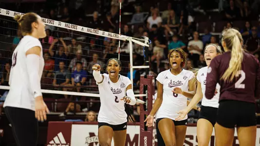 STARKVILLE, MS - October 15, 2022 - Mississippi State Middle Blocker/Right Setter Gabby Waden (#8), Mississippi State Middle Blocker Sania Petties (#6), Mississippi State Setter Gabby Coulter (#12), Mississippi State Outside Hitter/Right Setter Lauren Myrick (#18) and Mississippi State Defensive Specialist Lilly Gunter (#2) react during the match between the Florida Gators and the Mississippi State Bulldogs at the Newell-Grissom Building in Starkville, MS. Photo By Mike Mattina
