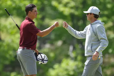NEW HAVEN, CT - May 18, 2022 - Mississippi State's Ruan Pretorius and Head Coach Dusty Smith during the final round of NCAA Regional play at Yale Golf Course in New Haven, CT.Photo by Rob Rasmussen
