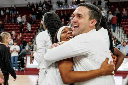 STARKVILLE, MS - November 20, 2022 - Mississippi State Guard Anastasia Hayes (#0) and Head Coach Sam Purcell after the game between the Colorado State Rams and the Mississippi State Bulldogs at Humphrey Coliseum in Starkville, MS. Photo By Laura Parsley