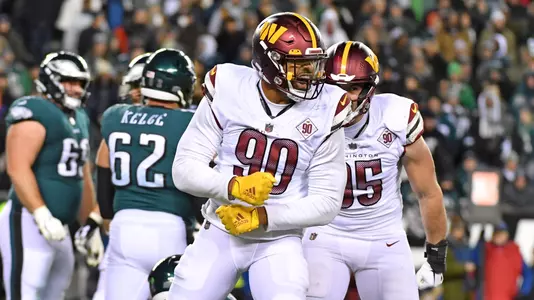 Nov 14, 2022; Philadelphia, Pennsylvania, USA; Washington Commanders defensive end Montez Sweat (90) celebrates after a sack against the Philadelphia Eagles during the fourth quarter at Lincoln Financial Field. Mandatory Credit: Eric Hartline-USA TODAY Sports