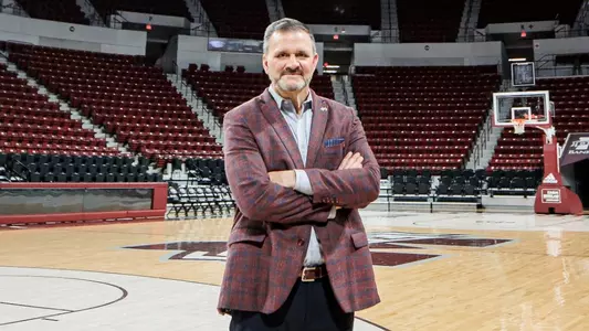 STARKVILLE, MS - March 21, 2022 - Mississippi State Head Coach Chris Jans poses at Humphrey Coliseum at Mississippi State University in Starkville, MS. Photo By Austin Perryman
