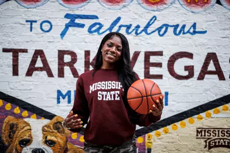 STARKVILLE, MS - July 13, 2022 - Mississippi State Forward Denae Carter (#25) during a street clothes photoshoot at the Starkvegas mural in Starkville, MS. Photo By Kevin Snyder