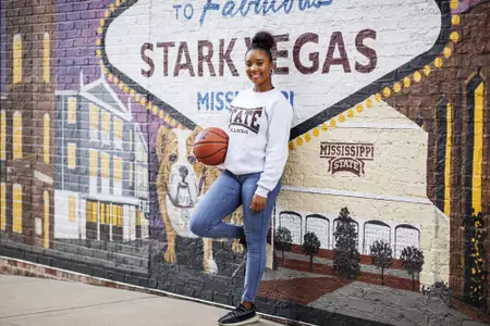 STARKVILLE, MS - July 13, 2022 - Mississippi State Forward Alasia Hayes (#5) during a street clothes photoshoot at the Starkvegas mural in Starkville, MS. Photo By Kevin Snyder
