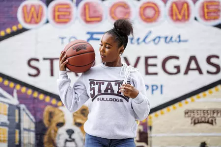 STARKVILLE, MS - July 13, 2022 - Mississippi State Forward Alasia Hayes (#5) during a street clothes photoshoot at the Starkvegas mural in Starkville, MS. Photo By Kevin Snyder
