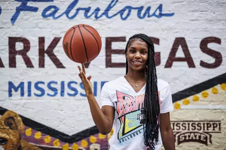 STARKVILLE, MS - July 13, 2022 - Mississippi State Guard Mia Moore (#12) during a street clothes photoshoot at the Starkvegas mural in Starkville, MS. Photo By Kevin Snyder