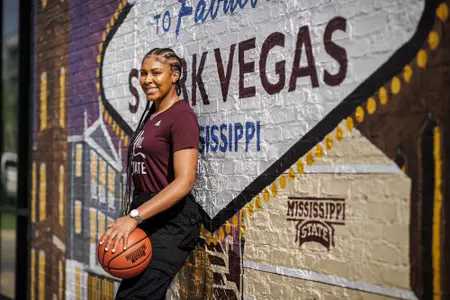 STARKVILLE, MS - July 13, 2022 - Mississippi State Guard Kourtney Weber (#11) during a street clothes photoshoot at the Starkvegas mural in Starkville, MS. Photo By Kevin Snyder