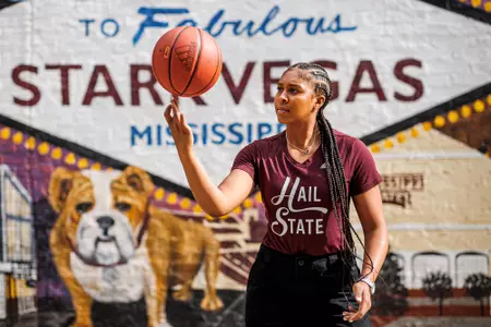STARKVILLE, MS - July 13, 2022 - Mississippi State Guard Kourtney Weber (#11) during a street clothes photoshoot at the Starkvegas mural in Starkville, MS. Photo By Kevin Snyder