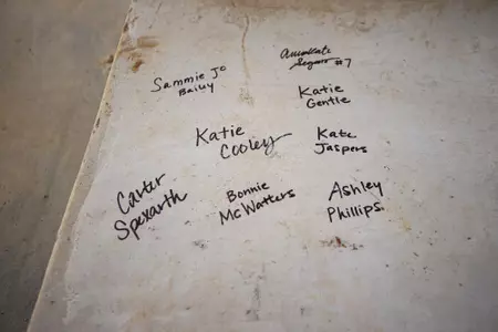 STARKVILLE, MS - November 04, 2022 - Names of former Mississippi State Bulldogs players signed on the foundation of the new indoor softball facility during the Fall World Series at Nusz Park in Starkville, MS. Photo By Mike Mattina