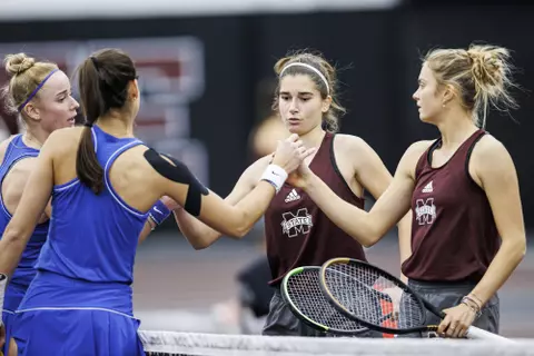 STARKVILLE, MS - January 22, 2022 - Mississippi State’s Magda Adaloglou and Chloé Cirotte during the match between the Memphis Tigers and the Mississippi State Bulldogs at the Rula Tennis Pavilion in Starkville, MS. Photo By Kevin Snyder