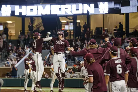 STARKVILLE, MS - March 11, 2022 - Mississippi State Infielder/Outfielder Matt Corder (#14) and Outfielder Kellum Clark (#11) during the game between the Princeton Tigers and the Mississippi State Bulldogs at Dudy Noble Field at Polk-Dement Stadium in Starkville, MS. Photo By Sloane Bush
