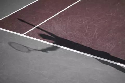 STARKVILLE, MS - March 18, 2022 - Mississippi State's Chloé Cirotte’s shadow during the match between the Auburn Tigers and the Mississippi State Bulldogs at the AJ Pitts Tennis Centre in Starkville, MS. Photo By Austin Perryman
