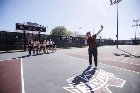 STARKVILLE, MS - March 20, 2022 - The Mississippi State Bulldogs after the match between the Alabama Crimson Tide and the Mississippi State Bulldogs at the AJ Pitts Tennis Centre in Starkville, MS. Photo By Kevin Snyder