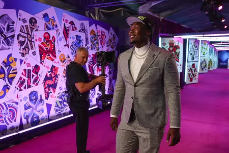 Mississippi State offensive lineman Charles Cross walks towards the stage after being selected by the Seattle Seahawks ninth overall during the 2022 NFL Draft on Thursday, April 28, 2022 in Las Vegas. (Ben Liebenberg/NFL)
