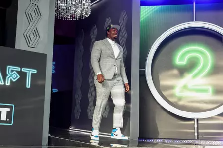 Mississippi State offensive lineman Charles Cross smiles as he walks on stage after being selected by the Seattle Seahawks during the 2022 NFL Draft on Thursday, April 28, 2022 in Las Vegas. (Mikey Owens/NFL)