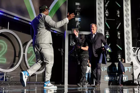 Mississippi State offensive lineman Charles Cross and NFL commissioner Roger Goodell embrace during the 2022 NFL Draft on Thursday, April 28, 2022 in Las Vegas. (Mikey Owens/NFL)