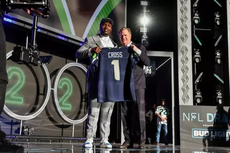 Mississippi State offensive lineman Charles Cross poses with NFL commissioner Roger Goodell after being selected during the 2022 NFL Draft on Thursday, April 28, 2022 in Las Vegas. (Mikey Owens/NFL)