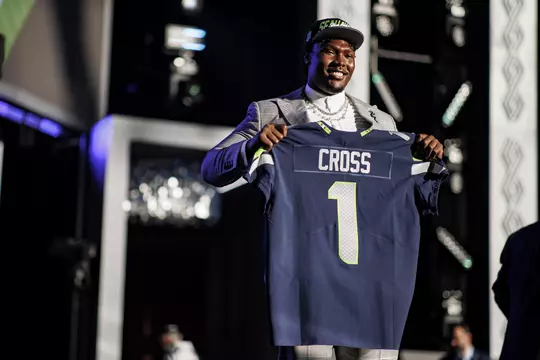 LAS VEGAS, NV - April 28, 2022 - Mississippi State Offensive Lineman Charles Cross holds up his jersey after being drafted 9th overall in the 2022 NFL Draft at Caesars Forum in Las Vegas, NV. Photo By Austin Perryman