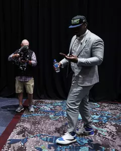 LAS VEGAS, NV - April 28, 2022 - Mississippi State Offensive Lineman Charles Cross participates in a media car wash after being drafted 9th overall in the 2022 NFL Draft at Caesars Forum in Las Vegas, NV. Photo By Austin Perryman