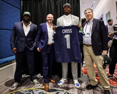 LAS VEGAS, NV - April 28, 2022 - Mississippi State Director of Football Recruiting Communications Rod Gibson, Offensive Line Coach & Run Game Coordinator Mason Miller, Offensive Lineman Charles Cross, and Head Coach Mike Leach pose during the 2022 NFL Draft at Caesars Forum in Las Vegas, NV. Photo By Austin Perryman