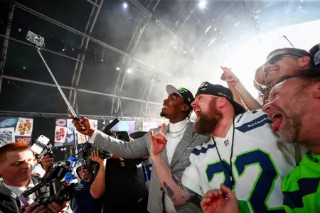 Mississippi State offensive lineman Charles Cross takes a selfie with Seattle Seahawks fans during the 2022 NFL Draft on Thursday, April 28, 2022 in Las Vegas. (Kevin Sabitus/NFL)