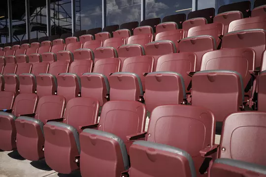 STARKVILLE, MS - July 05, 2022 - Padded chair back seats are installed at Davis Wade Stadium at Scott Field in Starkville, MS. Photo By Austin Perryman