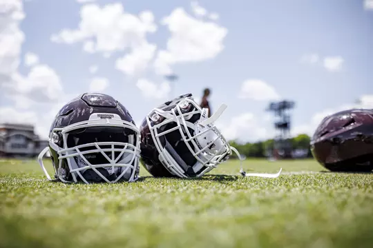 STARKVILLE, MS - August 06, 2022 - Helmets on the ground during a training camp practice at the Leo Seal Jr. Football Complex at Mississippi State University in Starkville, MS. Photo By Austin Perryman