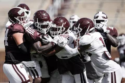 STARKVILLE, MS - August 13, 2022 - Mississippi State Running Back Jo'quavious "Woody" Marks (#7) and Defensive Back Collin Duncan (#19) during a fall camp scrimmage at Davis Wade Stadium at Scott Field in Starkville, MS. Photo By Austin Perryman