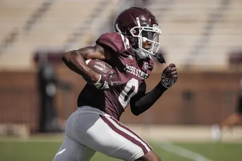 STARKVILLE, MS - August 13, 2022 - Mississippi State Wide Receiver Rara Thomas (#0) punts the ball during a fall camp scrimmage at Davis Wade Stadium at Scott Field in Starkville, MS. Photo By Austin Perryman
