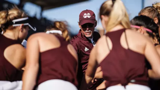 STARKVILLE, MS - March 18, 2022 - Mississippi State Head Coach Daryl Greenan during a team huddle during the match between the Auburn Tigers and the Mississippi State Bulldogs at the AJ Pitts Tennis Centre in Starkville, MS. Photo By Austin Perryman