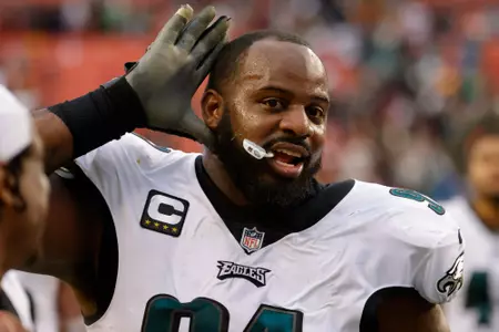 Jan 2, 2022; Landover, Maryland, USA; Philadelphia Eagles defensive tackle Fletcher Cox (91) celebrates while leaving the field after the game against the Washington Football Team at FedExField. Mandatory Credit: Geoff Burke-USA TODAY Sports