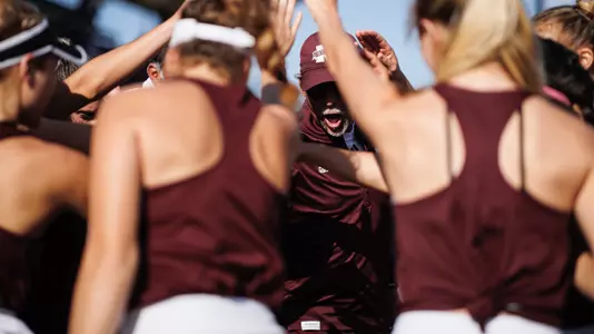 STARKVILLE, MS - March 18, 2022 - Mississippi State Head Coach Daryl Greenan during a team huddle during the match between the Auburn Tigers and the Mississippi State Bulldogs at the AJ Pitts Tennis Centre in Starkville, MS. Photo By Austin Perryman