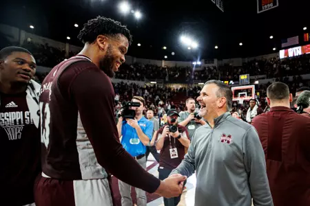 STARKVILLE, MS - January 07, 2023 - Mississippi State Forward Will McNair Jr (#13) and Mississippi State Head Coach Chris Jans after the game between the Ole Miss Rebels and the Mississippi State Bulldogs at Humphrey Coliseum in Starkville, MS. Photo By Mike Mattina