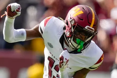 Sep 10, 2023; Landover, Maryland, USA; Washington Commanders cornerback Emmanuel Forbes (13) reacts after the Arizona Cardinals had an incomplete pass during the 4th quarter at FedExField. Mandatory Credit: Brent Skeen-USA TODAY Sports