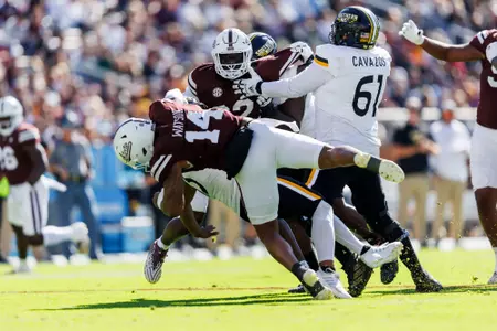 STARKVILLE, MS - November 18, 2023 - Mississippi State Linebacker Nathaniel Watson (#14) during the game between the Southern Mississippi Golden Eagles and the Mississippi State Bulldogs at Davis Wade Stadium at Scott Field in Starkville, MS. Photo By Bailey Black