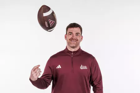 STARKVILLE, MS - December 18, 2023 - Mississippi State Tight Ends Coach Jon Cooper during New Coach Photo Shoot at the Leo Seal Jr. Football Complex at Mississippi State University in Starkville, MS. Photo By Mike Mattina