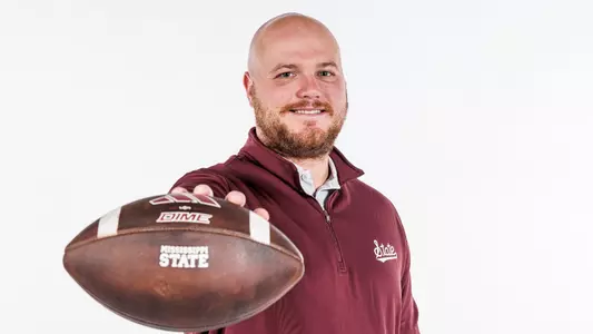STARKVILLE, MS - December 18, 2023 -Mississippi State Quarterbacks Coach Matt Holecek during New Coach Photo Shoot at the Leo Seal Jr. Football Complex at Mississippi State University in Starkville, MS. Photo By Mike Mattina